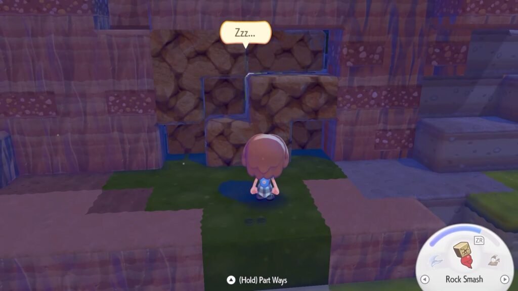 Character sleeping near rock wall. pokopia mosslax