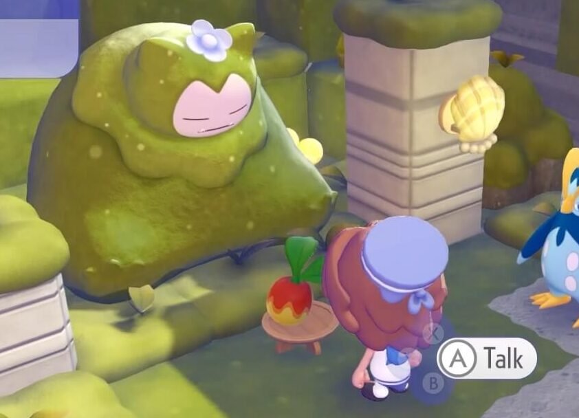 Offering Food For Mosslax in pokemon pokopia, to get Mosslax Buffs